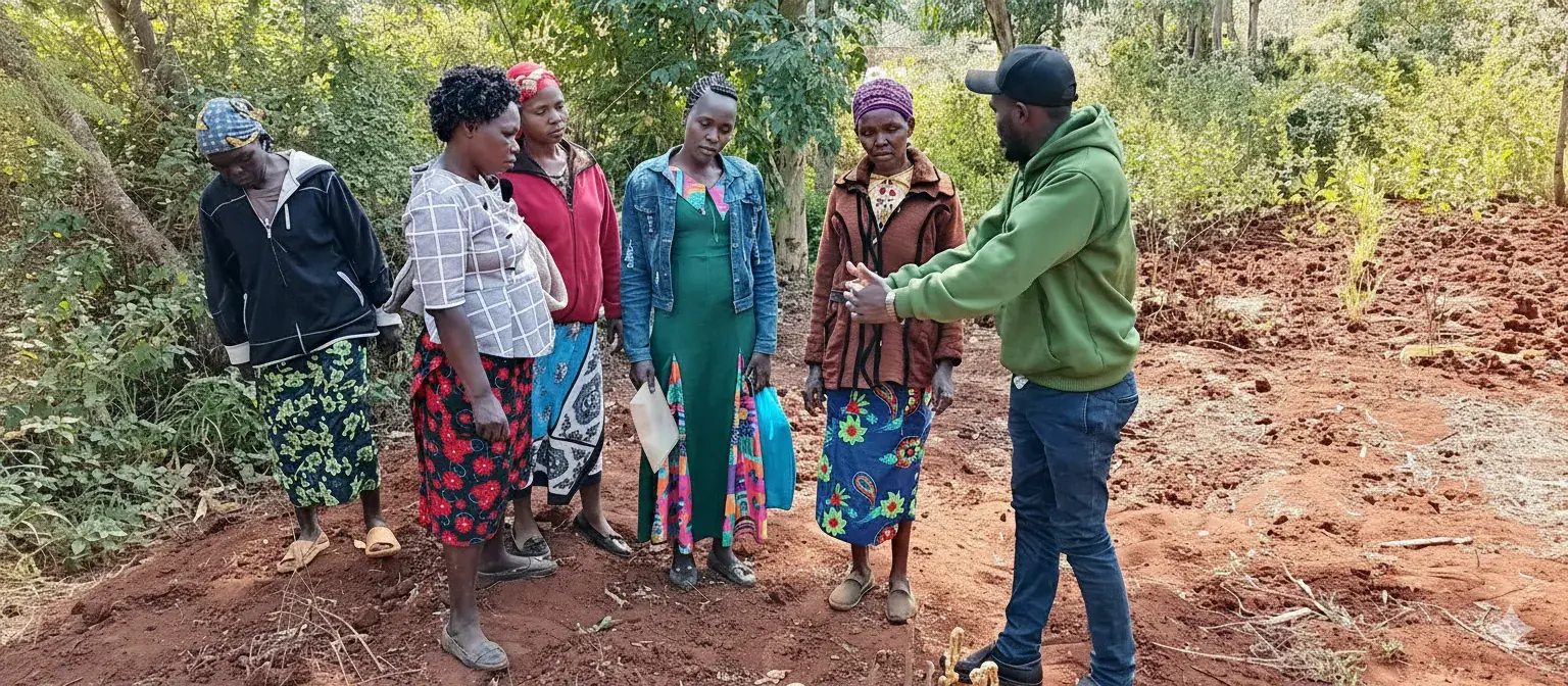 Women training together in a farm field